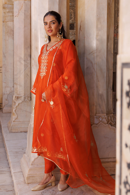Rust-orange silk, gota patti work kurta set